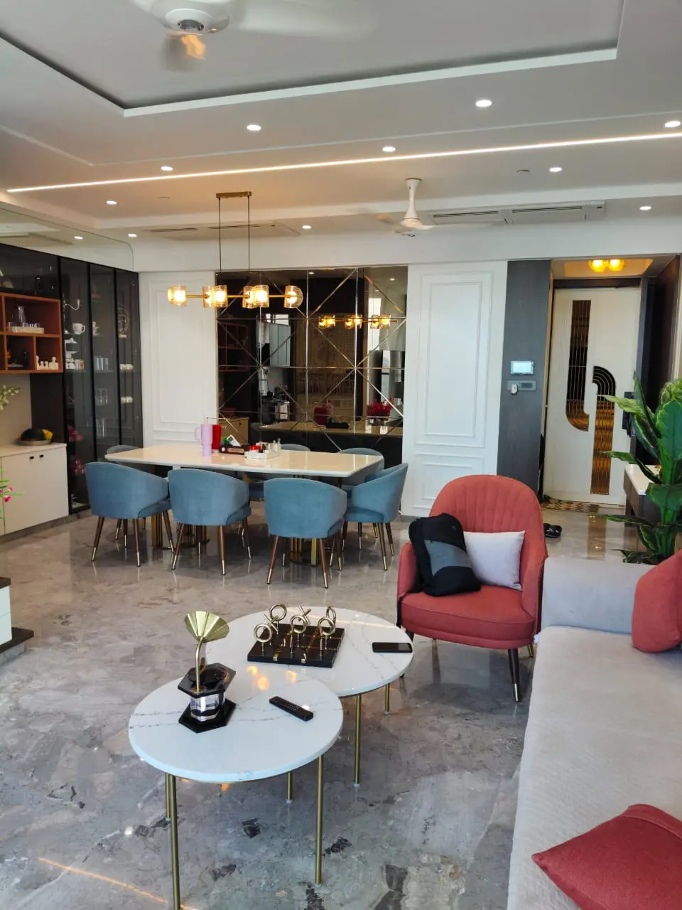 Adani Monte South: A furnished living and dining room