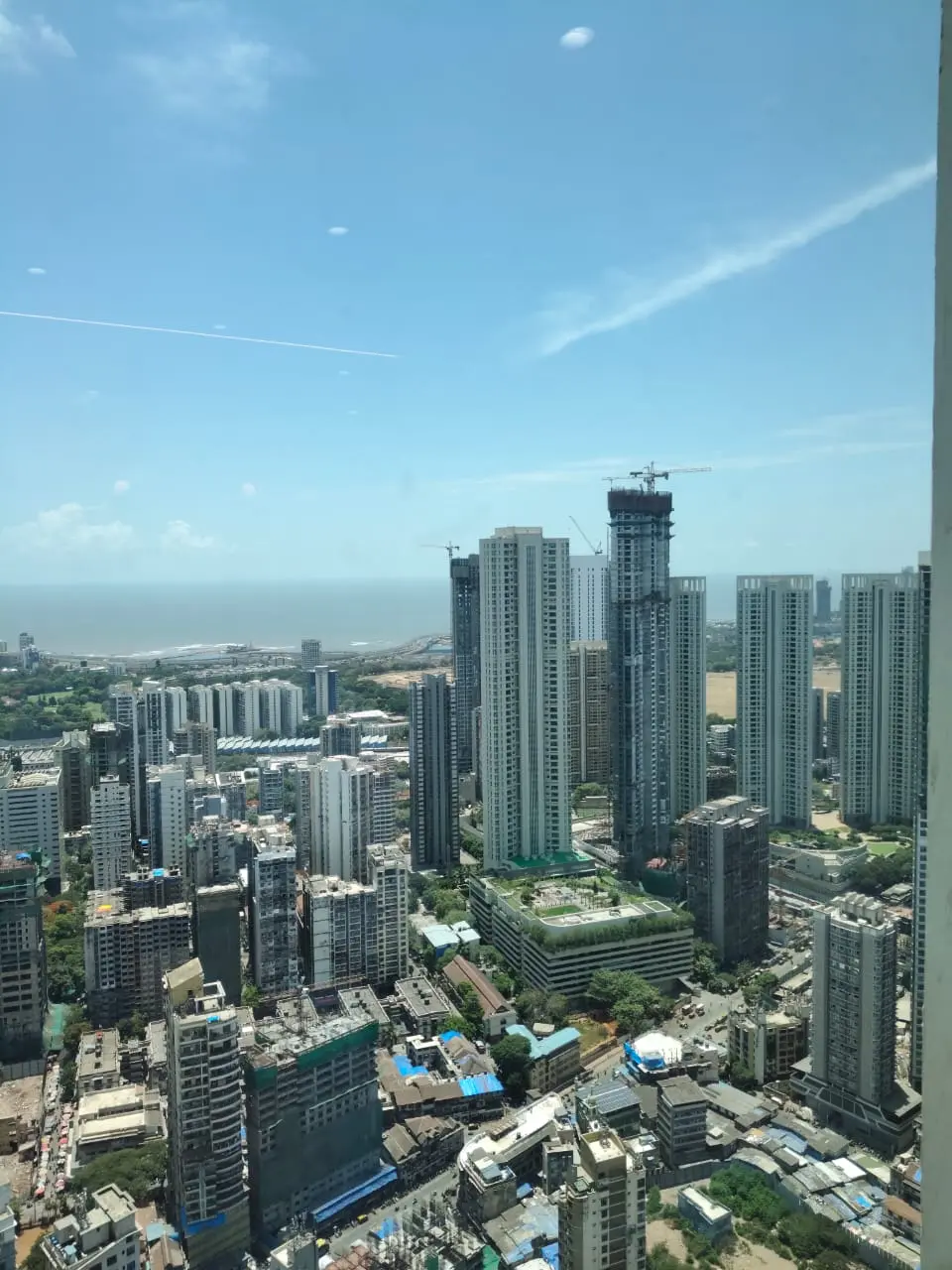 Adani Monte South: The skyline and the sea from a high floor